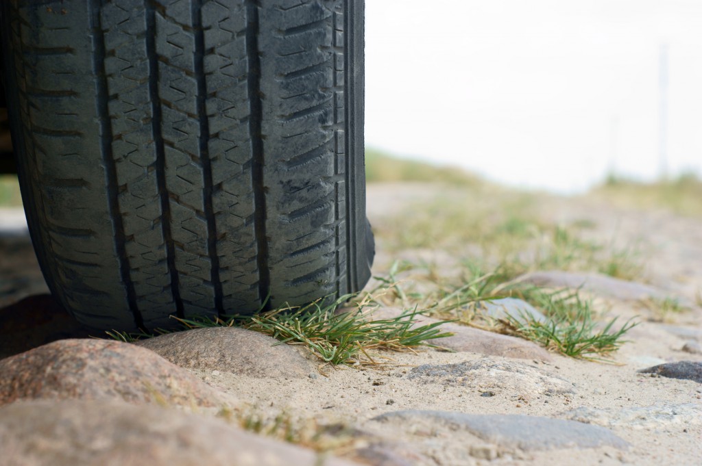 tire on road of stone